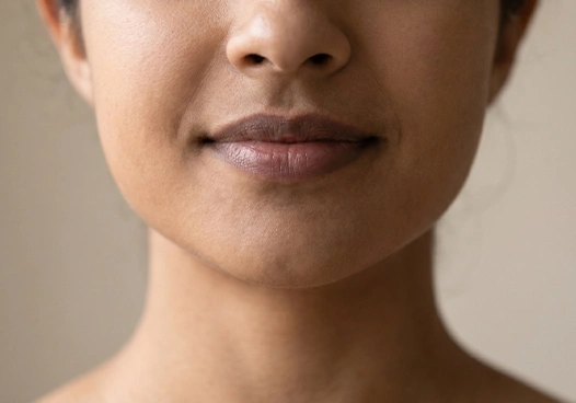 People with genetically darker lips