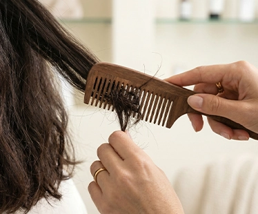 Tangling and breakage during combing